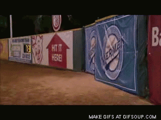 A Sign That Says Hit It Here Is On A Fence GIF