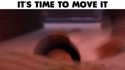 A Sign That Says It 'S Time To Move It With A Blurred Image GIF