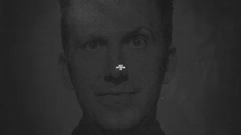 A Sign That Says Just Between Us With Two People Behind It GIF