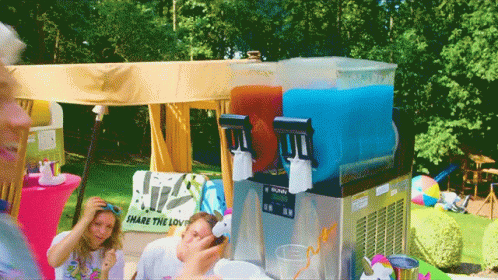 A Sign That Says Share The Love Is On The Table GIF