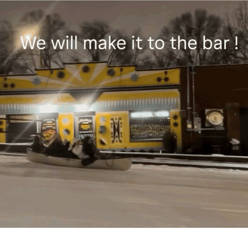 A Sign That Says We Will Make It To The Bar In Front Of A Building GIF