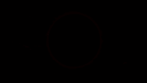 a sign that says welcome to the in front of a circle of lightning