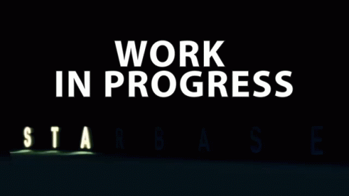 A Sign That Says Work In Progress Starbase In White Letters GIF