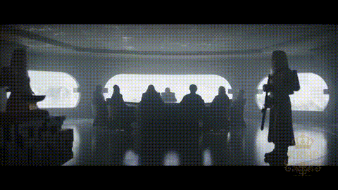 A Silhouette Of A Man Holding A Gun Standing In Front Of A Group Of People . GIF