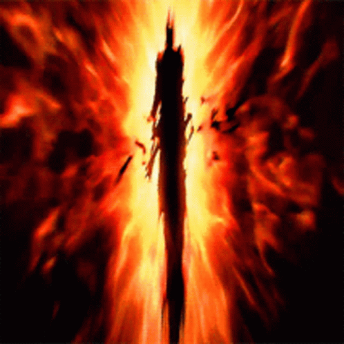 A Silhouette Of A Man Is Surrounded By Flames GIF