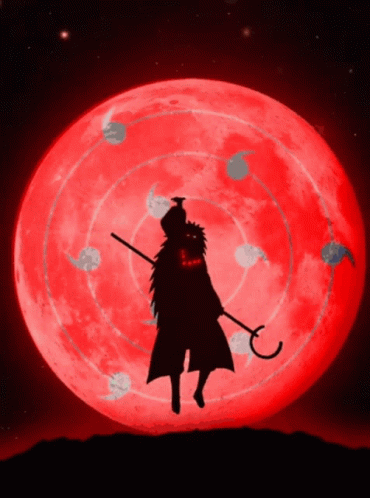 A Silhouette Of A Man With A Sword In Front Of A Red Moon GIF