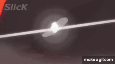 A Silhouette Of A Monster Standing In Front Of A Red Lightning Bolt . GIF