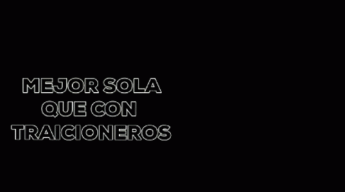 A Silhouette Of A Person In A Room With The Words Mejor Sola Que Con Traicioneros Above Them GIF
