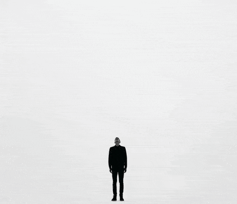 A Silhouette Of A Person Leaning Against A Wall With The Words " Feeling Stuck " Above Them GIF