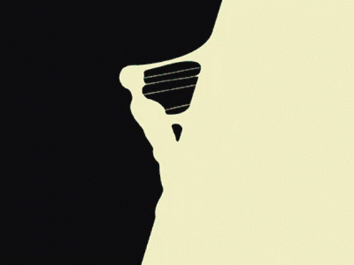 A Silhouette Of A Person 'S Face With A Black Background GIF