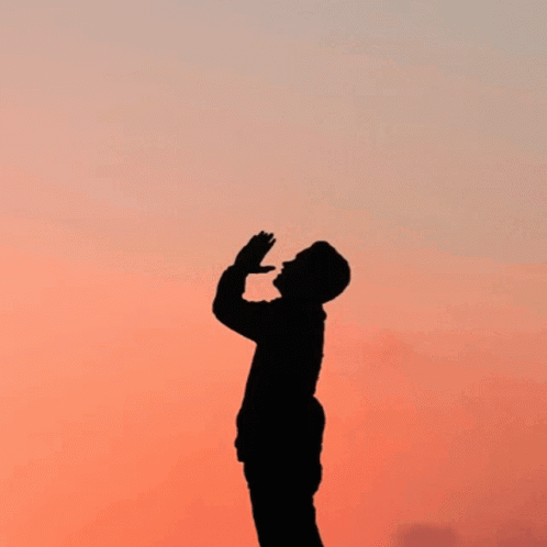 A Silhouette Of A Person Standing In Front Of The Words Things And Ings GIF