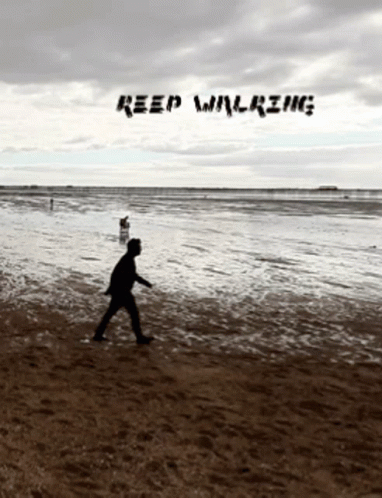 A Silhouette Of A Person Walking On A Beach With The Words " Keep Walking " On The Bottom GIF