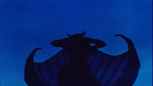a silhouette of a person with wings in the dark