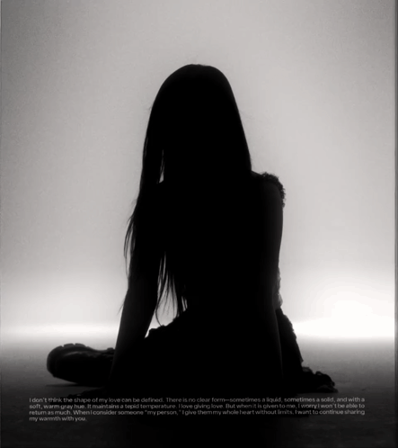 A Silhouette Of A Woman Sitting Down With A Quote On The Bottom GIF