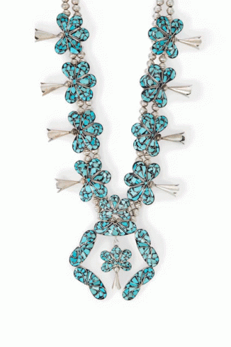 A Silver And Turquoise Ring With A Circle Of Turquoise Stones GIF