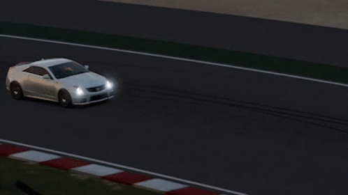 A Silver Car With A Triangle On The Roof GIF