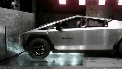 A Silver Car With The Number Test-87566 On The Side GIF