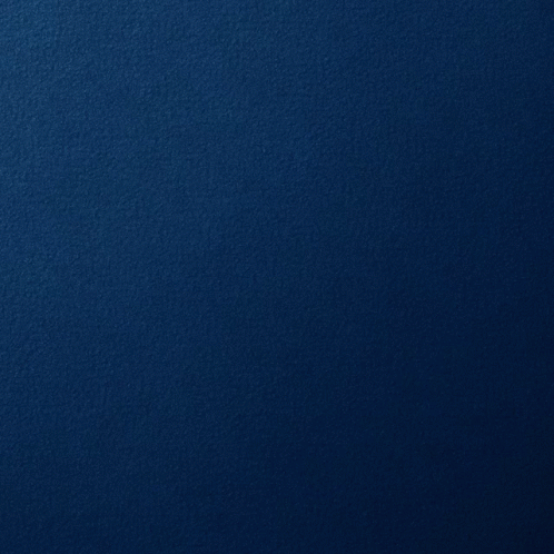A Silver Circle On A Blue Background With A Reflection GIF