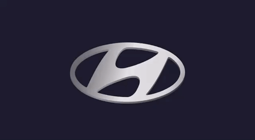 A Silver Hyundai Logo On A Dark Background GIF