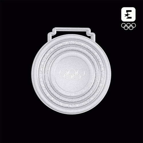 A Silver Medal With The Olympic Rings On The Front GIF