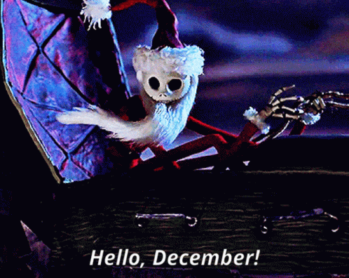 A Skeleton In A Santa Hat Is Sitting In A Coffin And Says Hello December GIF