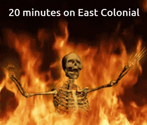 A Skeleton In Front Of A Fire With The Words 20 Minutes On East Colonial Above Him GIF