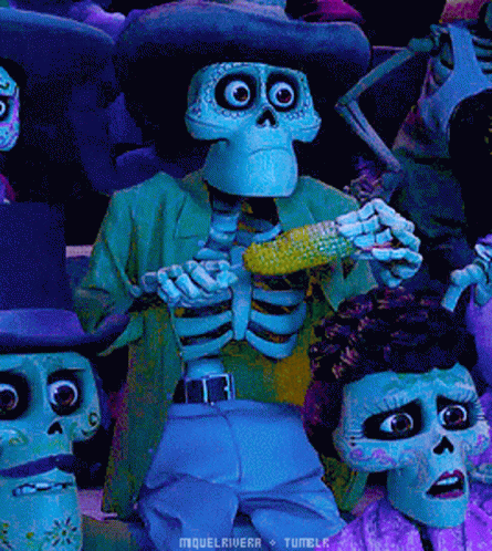 A Skeleton Is Holding A Corn On The Cob In A Crowd GIF