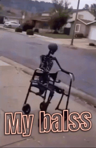 A Skeleton Is Pushing A Walker Down A Sidewalk With The Words " My Balss " Written On It GIF