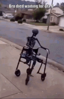 A Skeleton Is Sitting In A Wheelchair On The Sidewalk . GIF