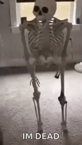 A Skeleton Is Standing In A Room In Front Of A Window . GIF