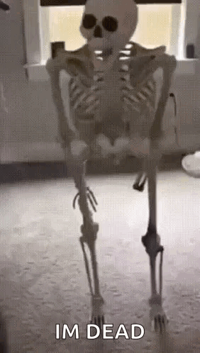 A Skeleton Is Standing In A Room With The Words `` Im Dead '' Written On It . GIF