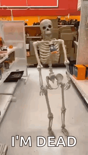 A Skeleton Is Standing In A Store With The Words `` I 'M Dead '' Written On The Floor . GIF