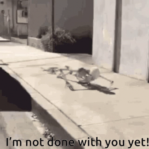A Skeleton Is Walking Down A Sidewalk And Says `` I 'M Not Done With You Yet ! '' GIF