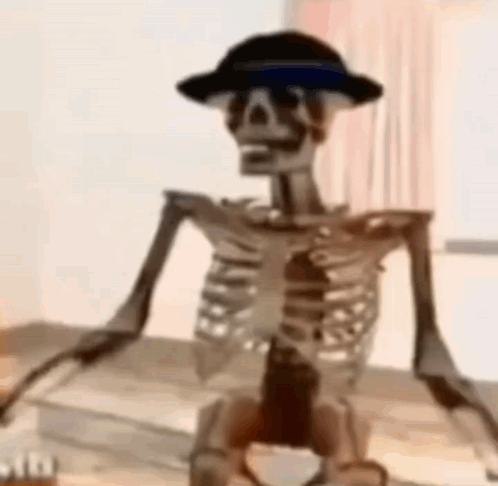 A Skeleton Wearing A Hat And Sunglasses Is Sitting On A Table Holding A Bottle . GIF
