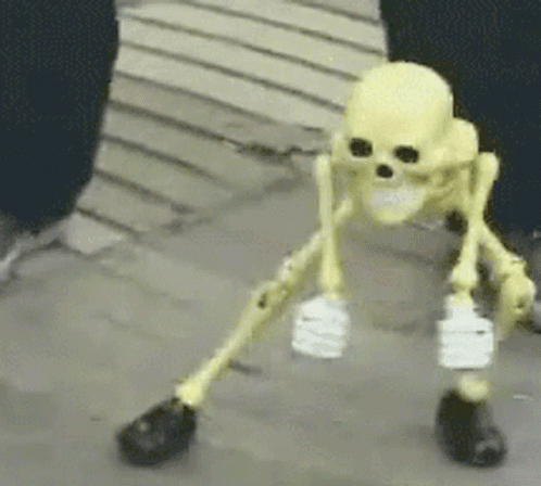 A Skeleton With A Bandage On Its Leg Is Standing On The Ground GIF
