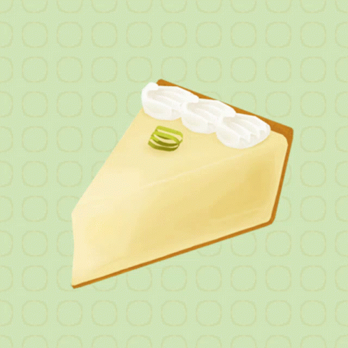 A Slice Of Key Lime Pie With Whipped Cream And Lime Zest On Top GIF