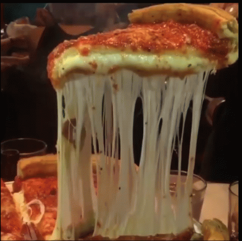 A Slice Of Pizza With A Lot Of Cheese Pulling Out Of It GIF