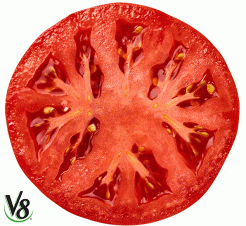 A Sliced Tomato With A V8 Logo On The Bottom Right GIF