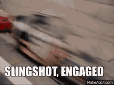 A Slingshot Engaged Gif With A Car Driving Down A Highway . GIF