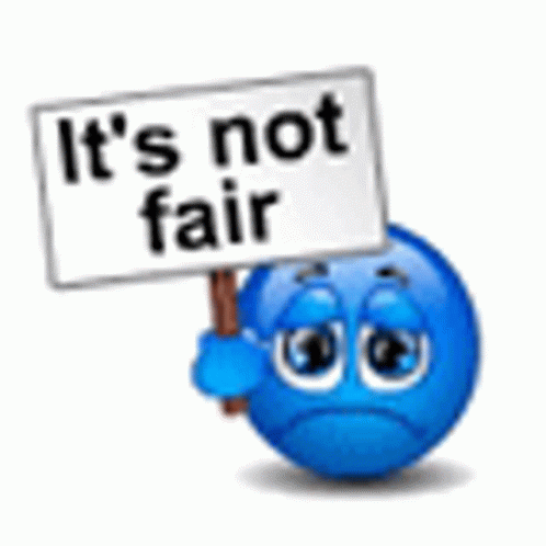 a smiley face is holding a sign that says `` it 's not fair '' .