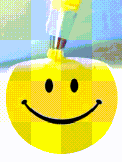 A Smiley Face With A Toothbrush In It GIF