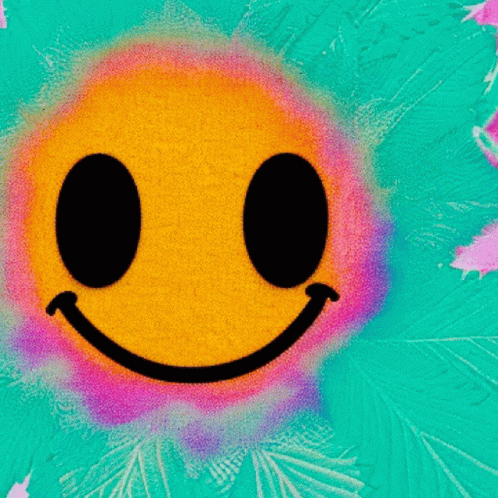 A Smiley Face With Black Eyes And A White Smile GIF