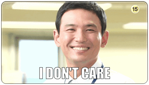 A Smiling Man With The Words " I Don T Care " On The Bottom GIF