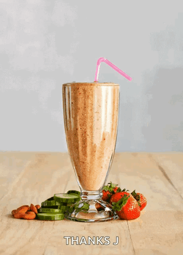 A Smoothie In A Tall Glass With Straws Next To Strawberries And Cucumbers And The Words Thanks J Below It GIF