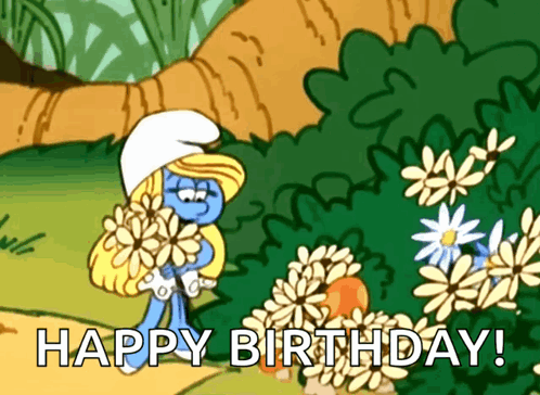 A Smurf Holding A Bunch Of Flowers With The Words Happy Birthday GIF
