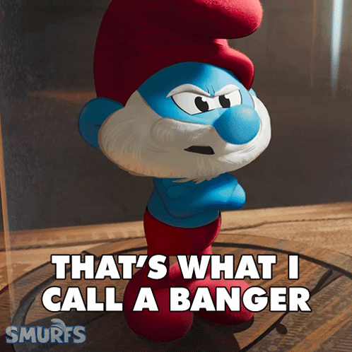 A Smurf Says " That 'S What I Call A Banger " While Standing On A Table GIF