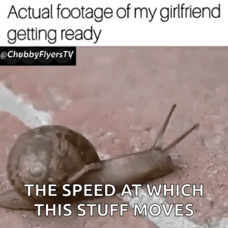 A Snail Is Crawling On The Ground With A Caption That Says " Actual Footage Of My Girlfriend Getting Ready " GIF