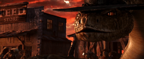 A Snake Wearing A Cowboy Hat Stands In Front Of A Store That Says Feed Store GIF