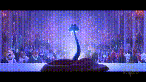 A Snake With A Long Neck Is Standing In Front Of A Crowd Of People At A Party . GIF