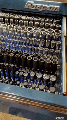a snap-on toolbox filled with lots of sockets and bits